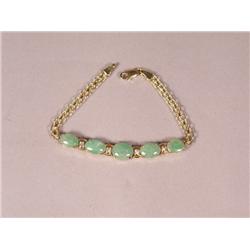 A 14 kt Yellow Gold, Jade and Diamond Bracelet,