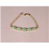 Image 1 : A 14 kt Yellow Gold, Jade and Diamond Bracelet,