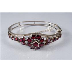 A Gold Plated, Garnet and Pearl Bracelet.