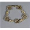 Image 2 : A 14 kt Yellow Gold Garnet Bracelet,