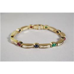 A Ladies 18 kt Yellow Gold, Ruby, Sapphire and Emerald Segmented Line Bracelet,