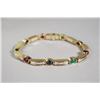 Image 1 : A Ladies 18 kt Yellow Gold, Ruby, Sapphire and Emerald Segmented Line Bracelet,