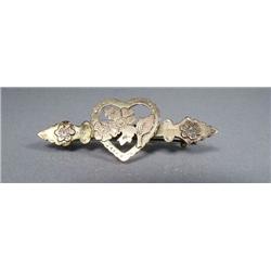 A Low kt Yellow and Rose Gold Heart Form Brooch.