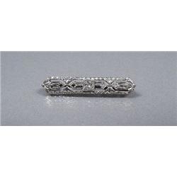 A 14 kt Yellow and White Gold Diamond Bar Pin.