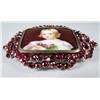 Image 2 : A Garnet and Porcelain Brooch.