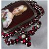 Image 4 : A Garnet and Porcelain Brooch.