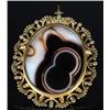Image 2 : A Carved Russian Agate Cameo with 18 kt Yellow Gold, Diamond and Pearl Frame with Black and White En