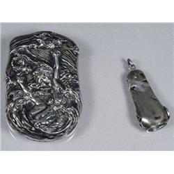 A Sterling Silver Matchcase together with a Serling Silver Cigar Clipper.