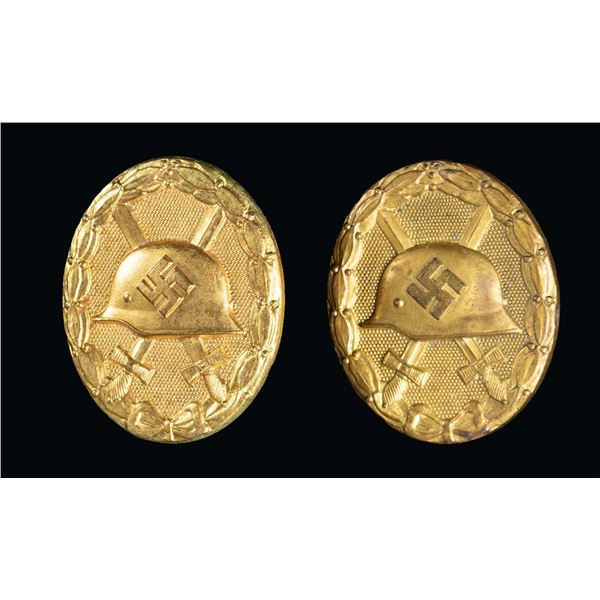 WWII GERMAN GOLD WOUND BADGE AND A REPRODUCTION.