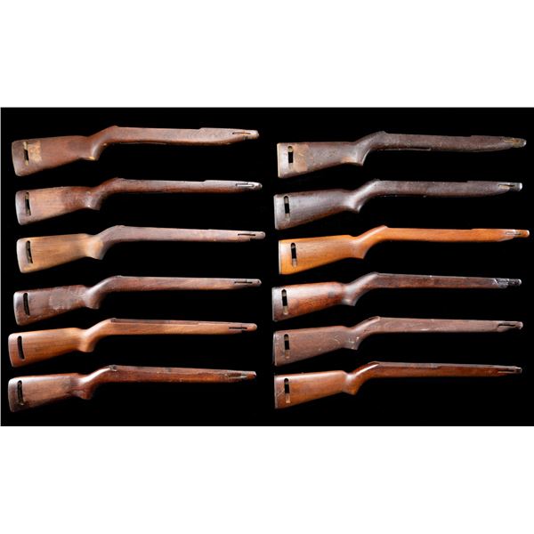 GROUPING OF 12 M1 CARBINE STOCKS.