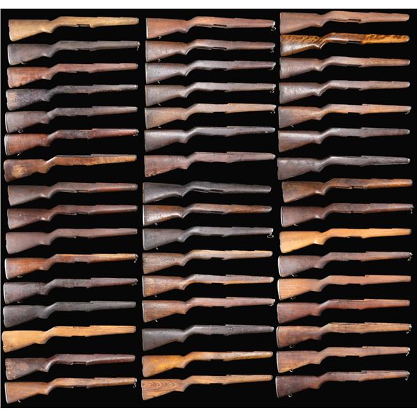 GROUPING OF 48 M1 GARAND RIFLE BUTTSTOCKS.
