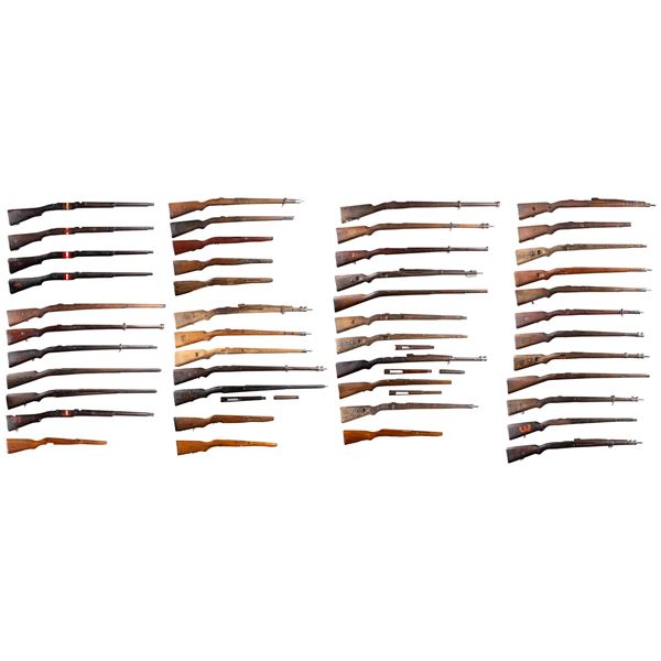 GROUP OF 46 MILITARY RIFLE STOCKS.