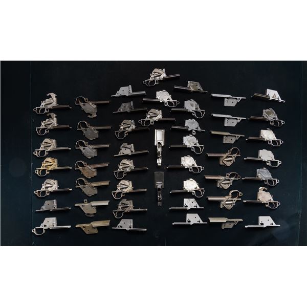 DESIRABLE GROUPING OF 49 M1 GARAND TRIGGER HOUSING