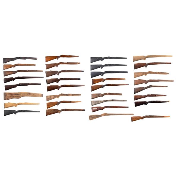 GROUPING OF 32 SPORTING RIFLE STOCKS.