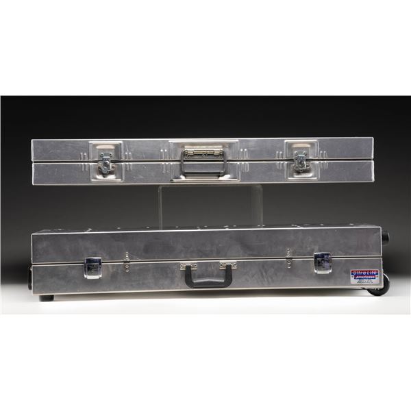 2 ALUMINUM HARD CASES.