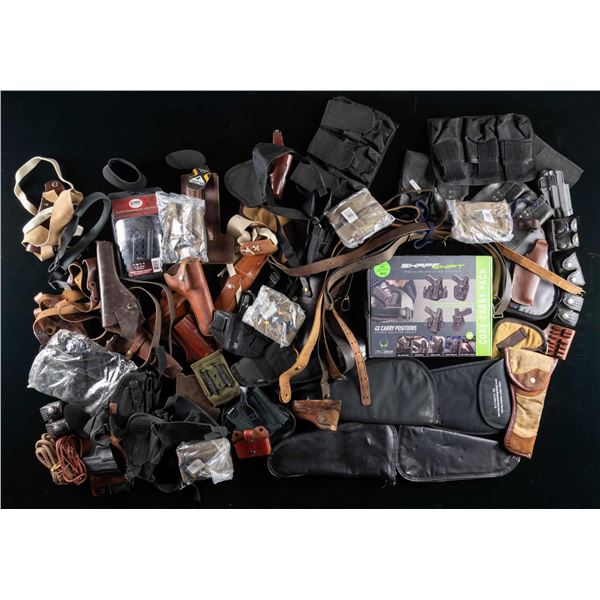 LOT OF ASSORTED HOLSTERS, SLINGS, & ACCESSORIES.