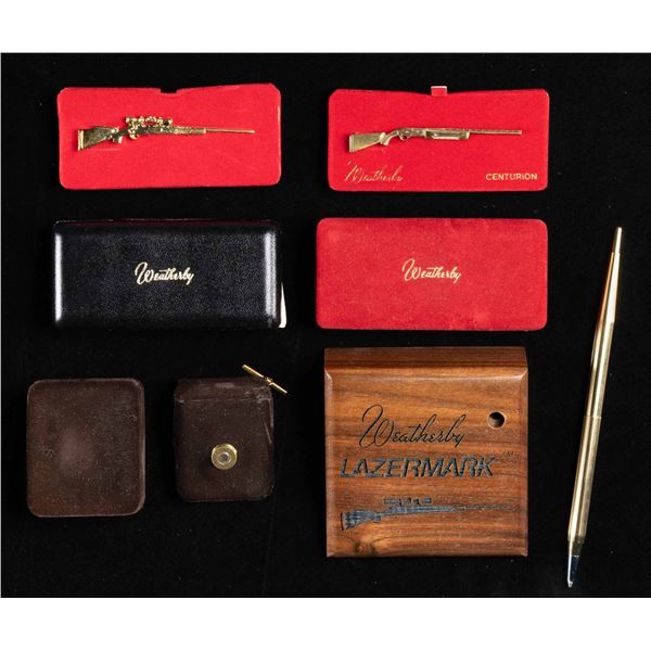 LOT OF 4 PIECES OF WEATHERBY MEMORABILIA.