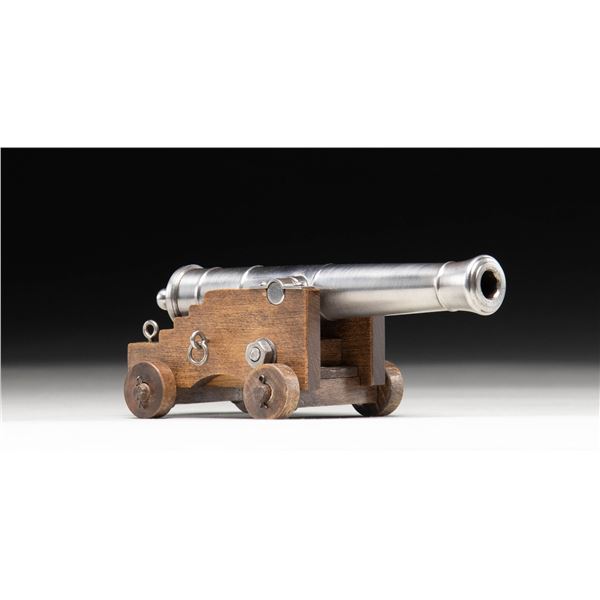 MINIATURE SPANISH CANNON WITH CARRIAGE.