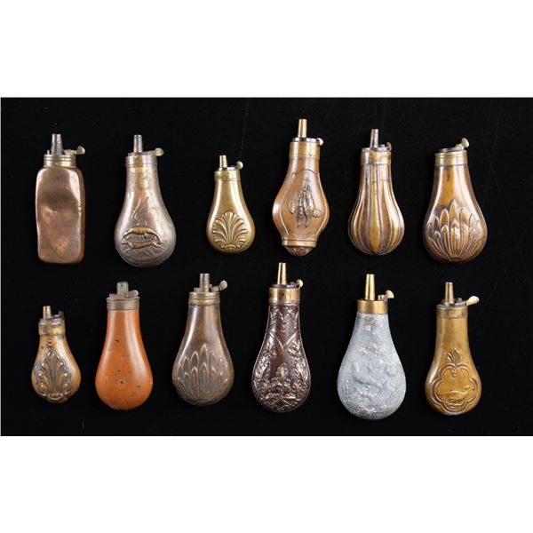 TWELVE PISTOL POWDER FLASKS.
