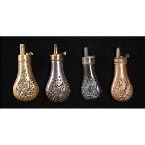 FOUR EAGLE PISTOL FLASKS.
