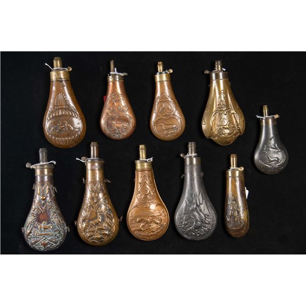TEN DECORATED HUNTING POWDER FLASKS.