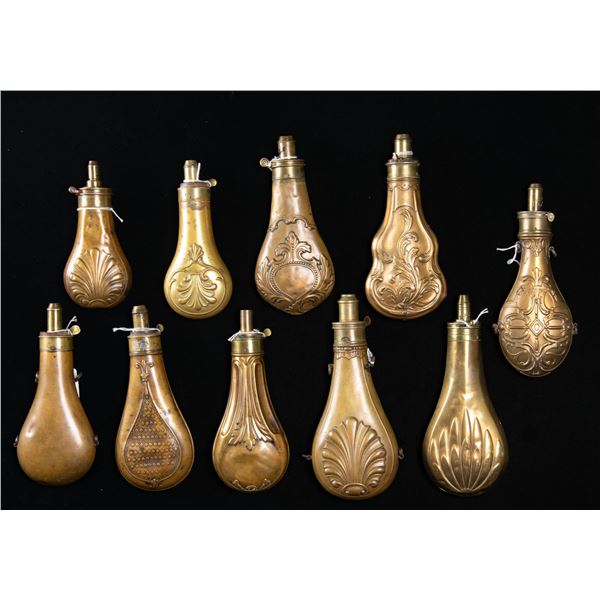TEN DECORATED HUNTING POWDER FLASKS.