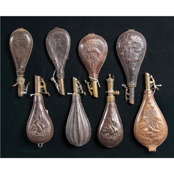 EIGHT VICTORIAN EMBOSSED LEATHER SHOT POUCHES.