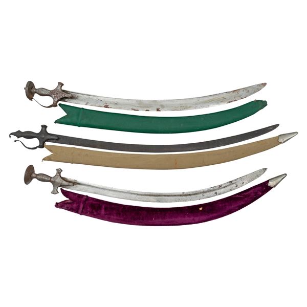 THREE 17th-18th CENTURY INDIAN TULWAR SWORDS.