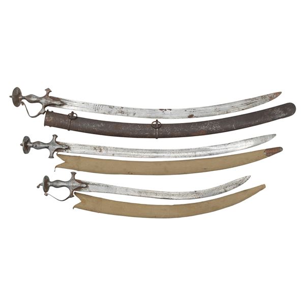 THREE 17th-18th CENTURY INDIAN TULWAR SWORDS.
