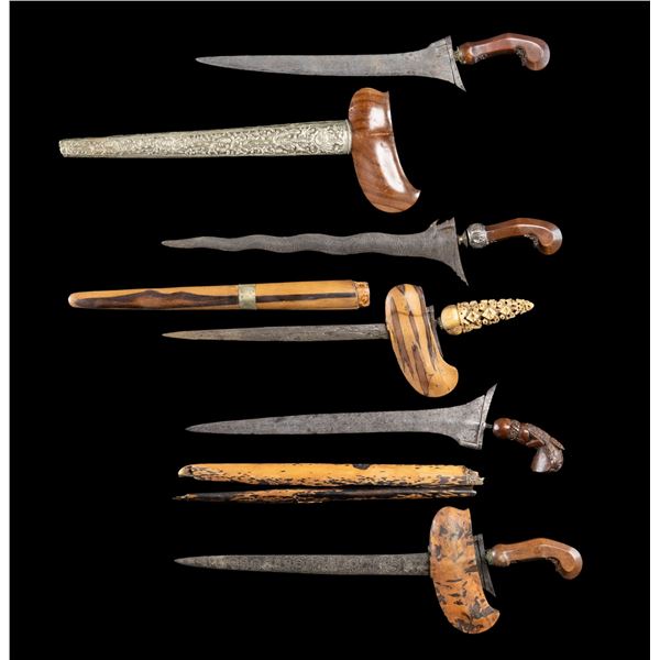 FIVE VINTAGE DAMASCUS JAVANESE KRIS DAGGERS.