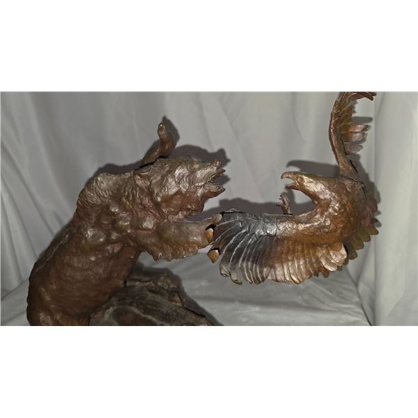 Johnathan Bronson Bronze Bear, an Eagle on a Log, and an Antler Shed on a circular Wooden Base