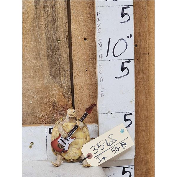Rock & Roll Turtle Playing Guitar