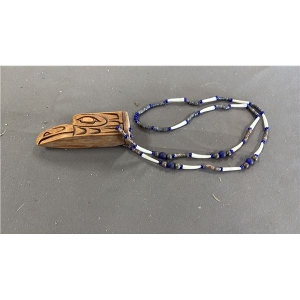 HAND CARVED FIRST NATIONS WOOD EAGLE PENDANT WITH COPPER INLAY EYES ON BEADED CHAIN: APPROX. 3.5"L