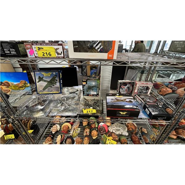 SHELF OF ASSORTED DIECAST SCALE MODEL AIRPLANES: CORGI, MRC, POSTAGE STAMP PLANES & MORE