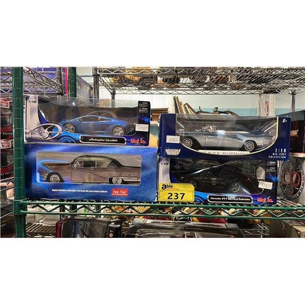 (4) ASSORTED DIECAST 1:18 SCALE MODEL CARS IN BOXES