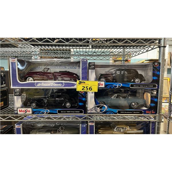 (4) ASSORTED DIECAST 1:18 SCALE MODEL CARS IN BOXES