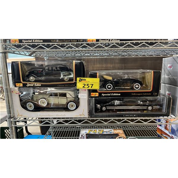 (4) ASSORTED DIECAST 1:18 SCALE MODEL CARS IN BOXES