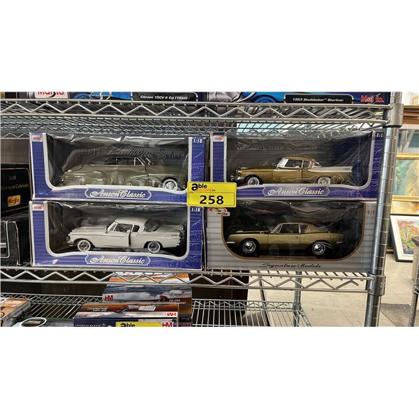 (4) ASSORTED DIECAST 1:18 SCALE MODEL CARS IN BOXES