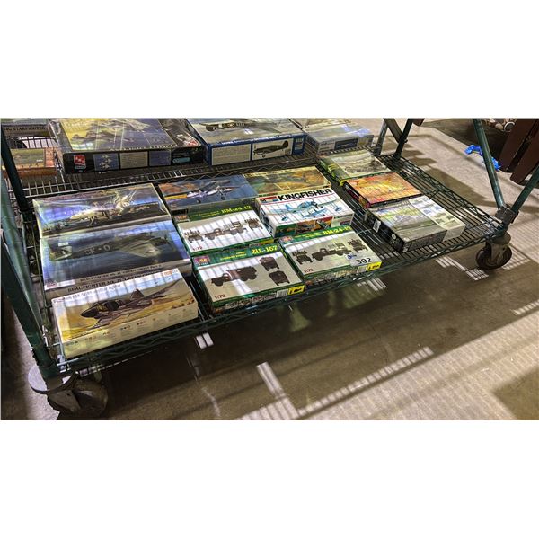 SHELF OF ASSORTED AIR & GROUND VEHICLE MODEL KITS: ICM, MASTER BOX, REVELL & MORE