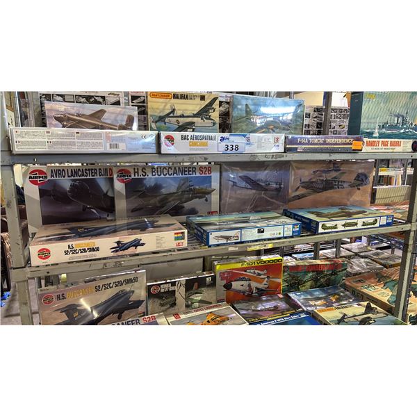 SHELF OF ASSORTED AIRPLANE MODEL KITS: AIRFIX, TRUMPETER & HASEGAWA