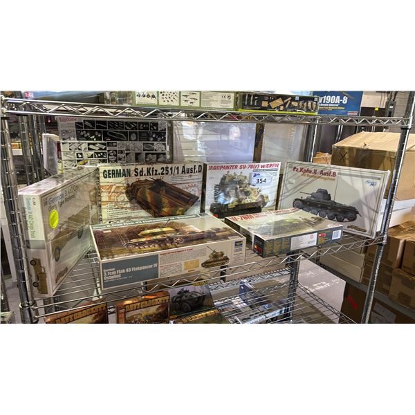 SHELF OF ASSORTED MILITARY TANK MODEL KITS & A GERMAN CARGO TRUCK MODEL KIT
