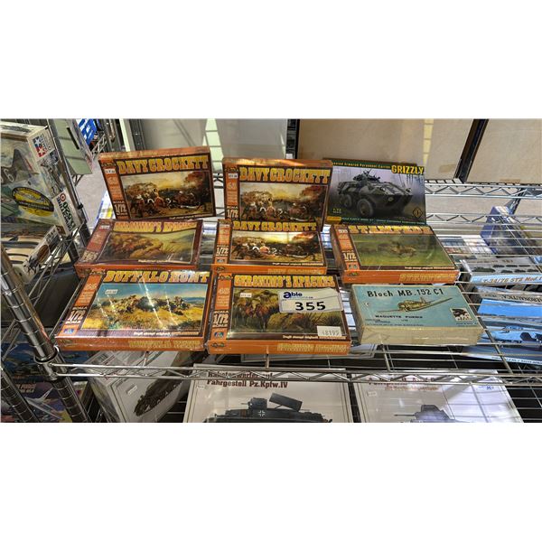 SHELF OF ASSORTED NEXUS MODEL FIGURES KITS, ACE GRIZZLY ARMORED PERSONNELL CARRIER MODEL KIT & MORE