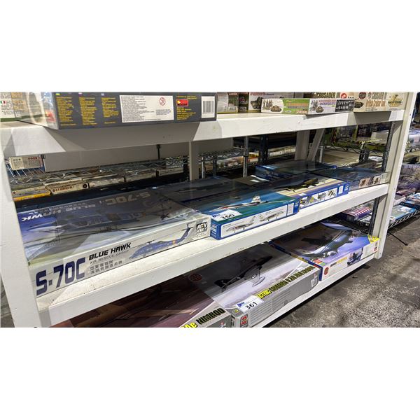 SHELF OF ASSORTED HELICOPTER & AIRPLANE MODEL KITS: TRUMPETER, MONOGRAM & ARV CLUB