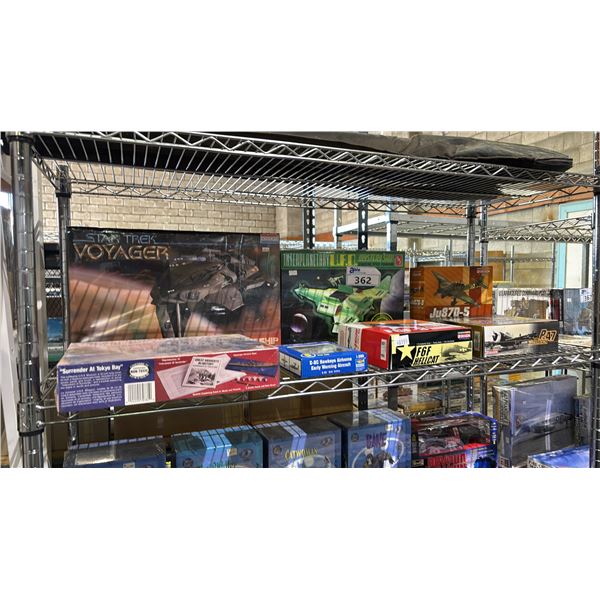 SHELF OF ASSORTED MODEL KITS: STAR TREK VOYAGER KAZON SHIP, F6F-3 HELLCAT, P-47 RAZORBACK & MORE