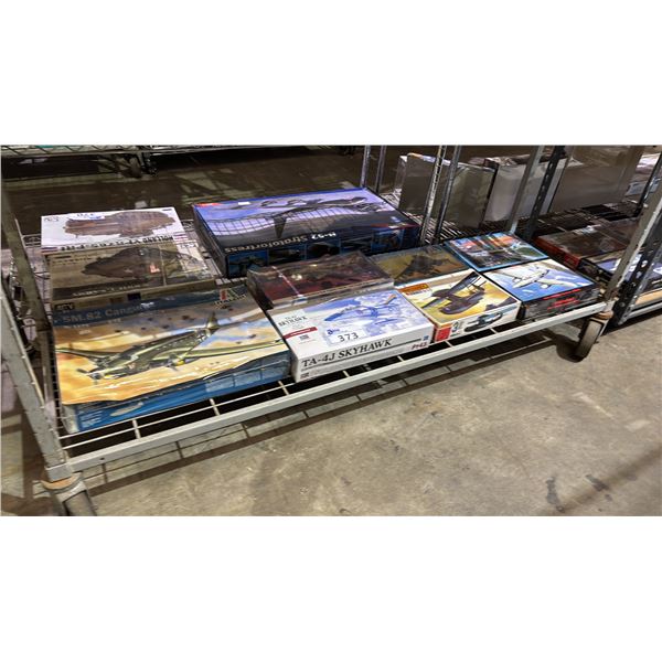 SHELF OF ASSORTED AIRPLANE MODEL KITS