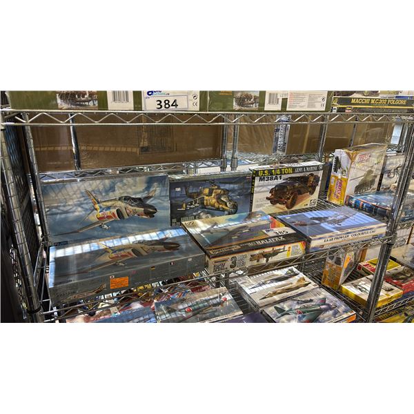 SHELF OF ASSORTED MODEL AIRCRAFT KITS & A U.S 1/4 TON 4X4 MODEL KIT