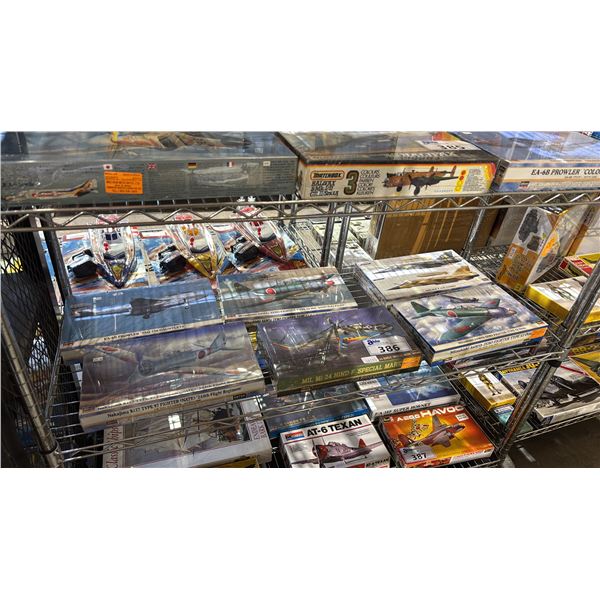 SHELF OF ASSORTED AIRPLANE MODEL KITS