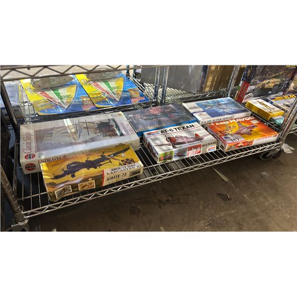 SHELF OF ASSORTED AIRPLANE MODEL KITS & (1) ENDEAVOR 1768 SHIP MODEL KIT