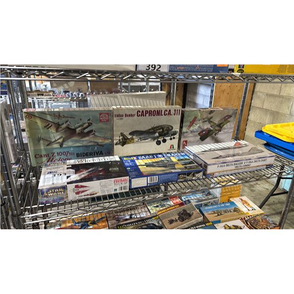 SHELF OF ASSORTED AIRPLANE MODEL KITS