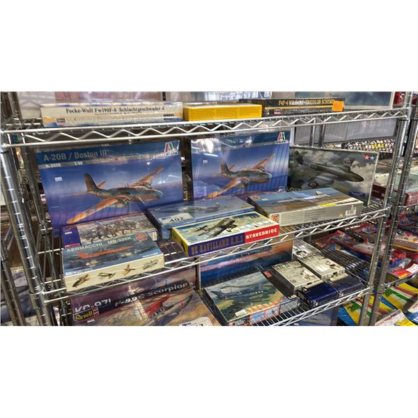 SHELF OF ASSORTED AIRPLANE MODEL KITS & BURGUNDIAN MOUNTED KNIGHTS